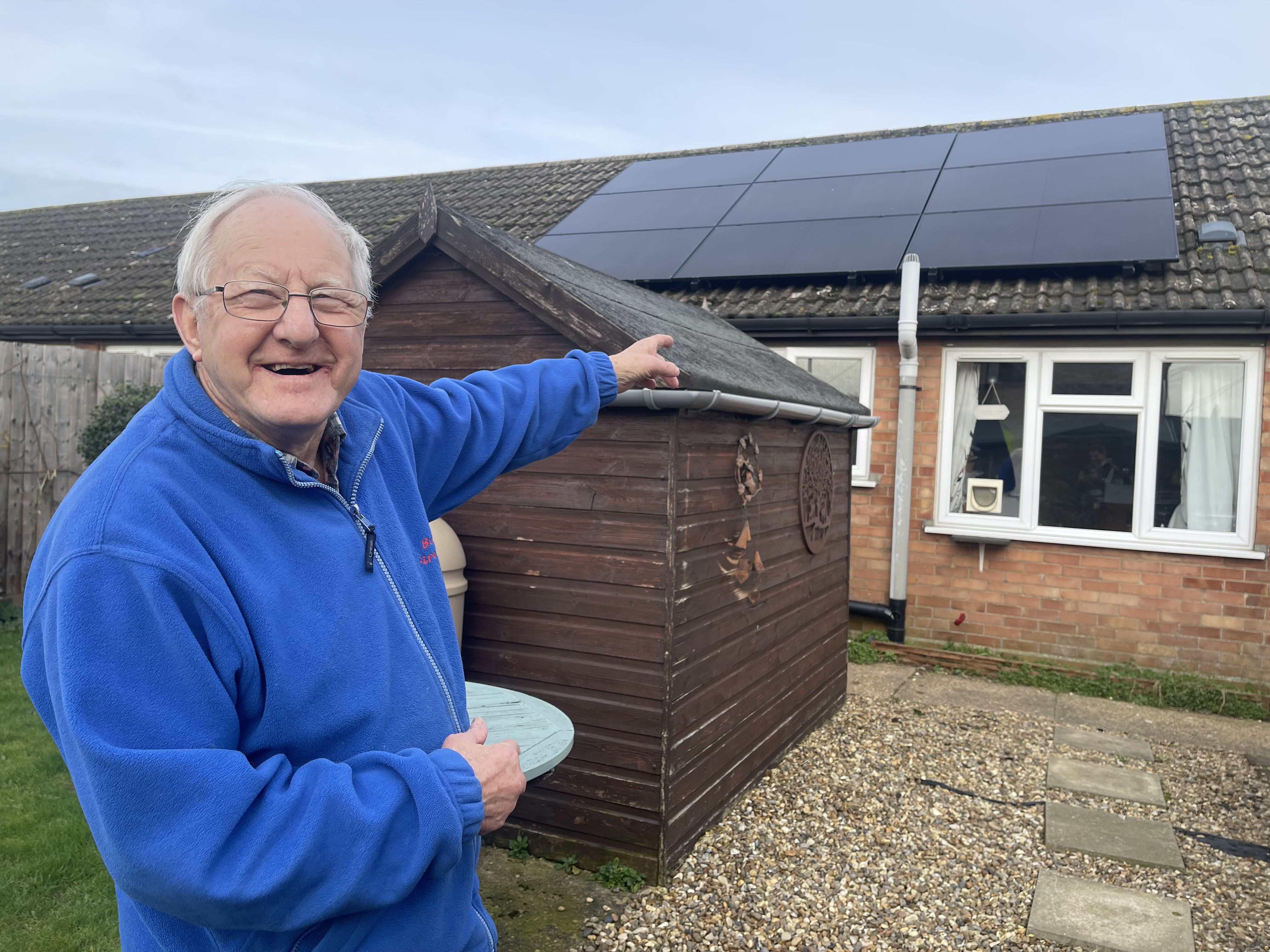 John Philips, a Bromford Flagship customer, with rooftop solar panels installed in a previous wave of the scheme.